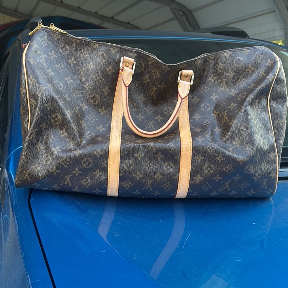 Louis Vuitton Brown and Tan Duffel Bags with Iconic Monogram
